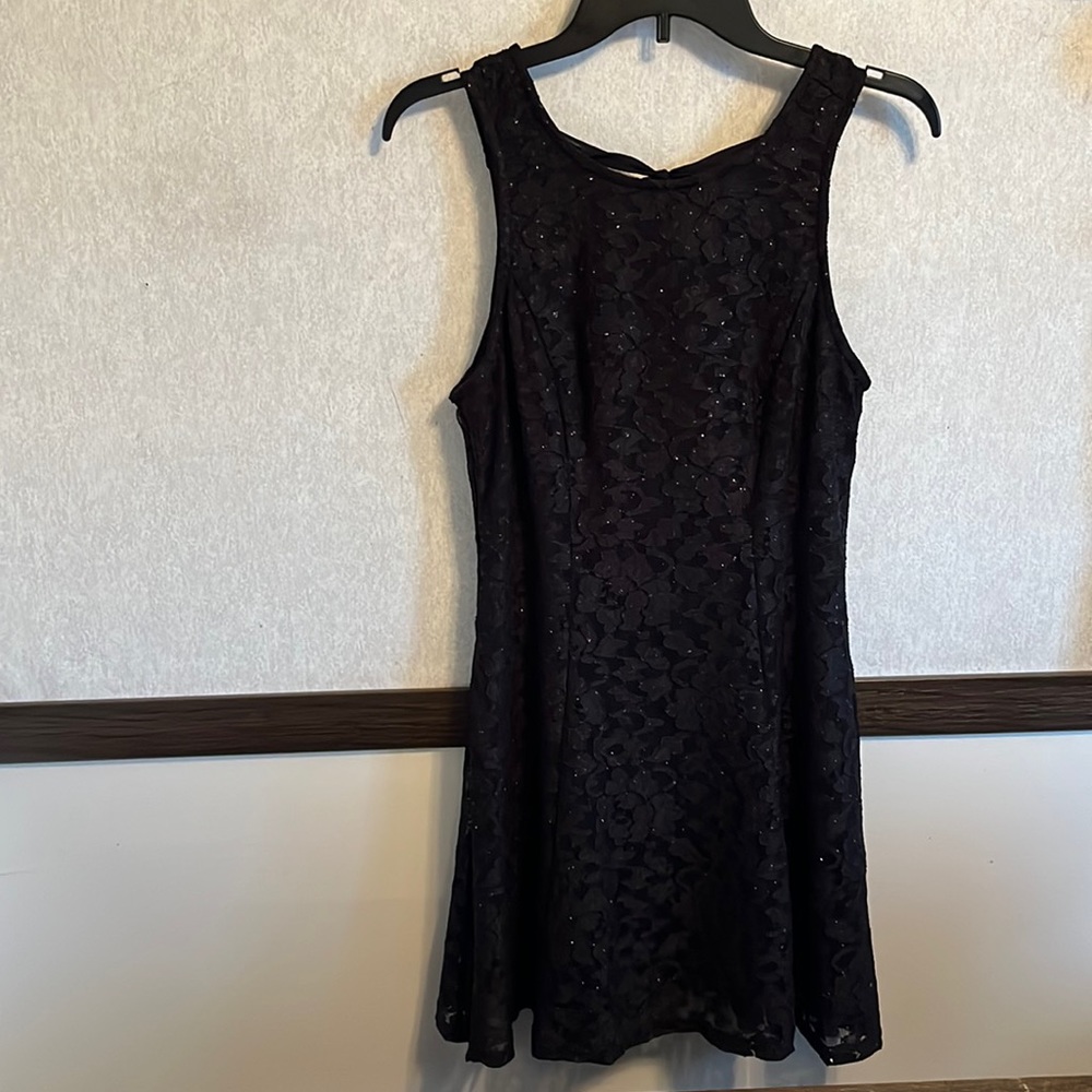 Large black shimmering evening dress.